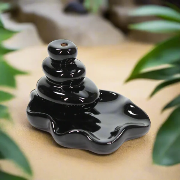 large-pebbles-into-pool-back-flow-incense-burner